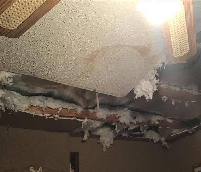 Ceiling falling down from a leak from the roof